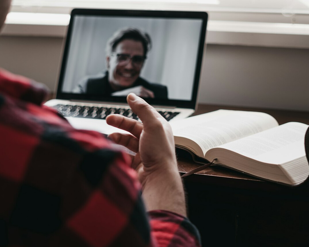 person using laptop video call